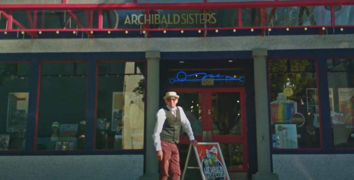 Longtime Archibald Sisters owner Phil Rollins outside his business on Capitol Way in downtown Olympia. The business has turned 50.