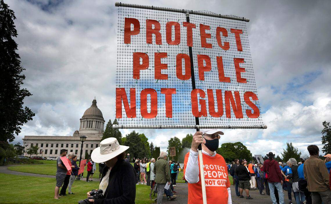 Jeff Snyder of Olympia stands with other gun-control advocates from around the Puget Sound during the March For Our Lives at the state Capitol in Olympia on Saturday.