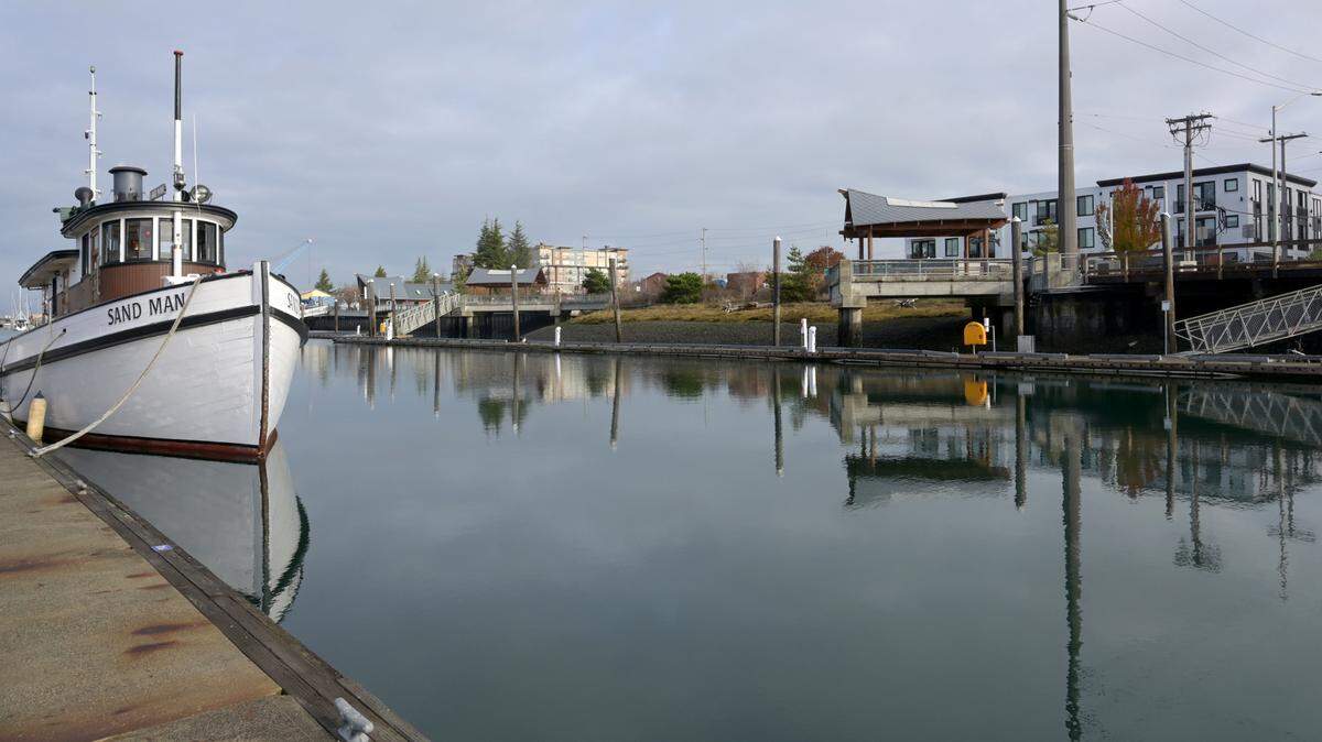 Taken at Percival Landing on the downtown Olympia waterfront on Nov. 23, 2022 the historic tug Sand Man is pictured during a regular tidal cycle.