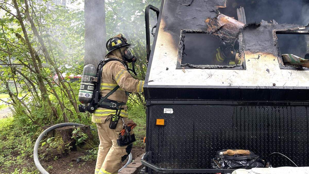 A man suffered smoke inhalation after a camper burned Monday morning on Kelly Beach Road.