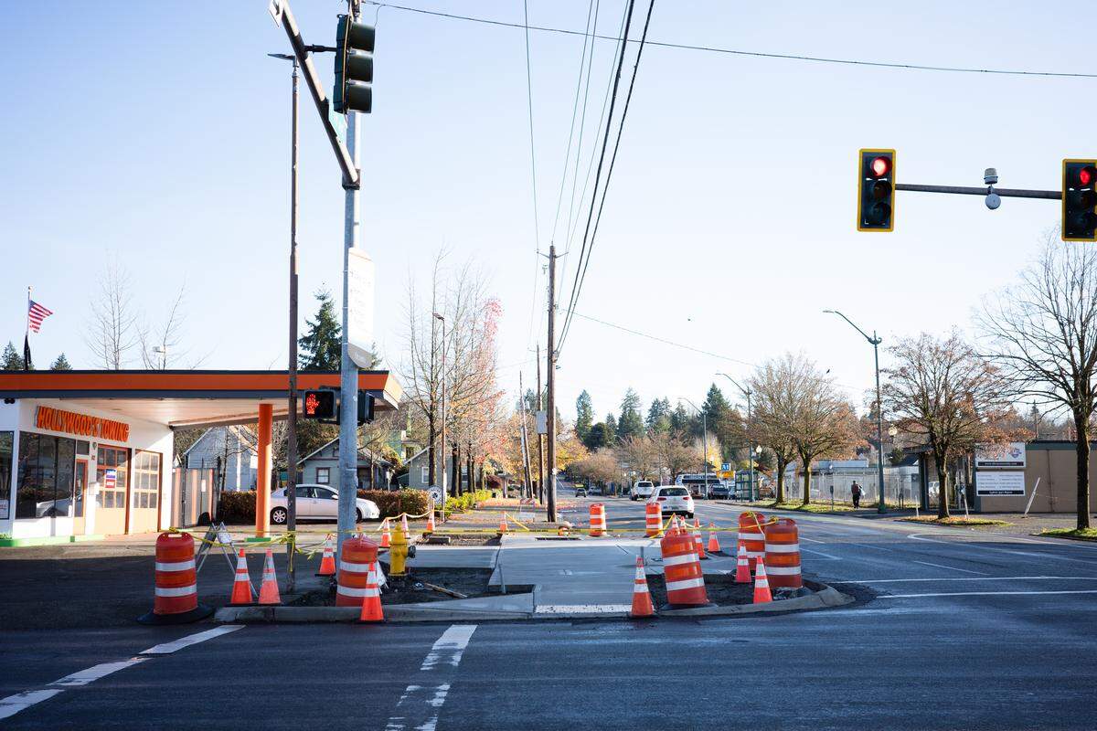 In-progress sidewalk improvements at the northeast corner of Fourth Avenue and Plum Street in downtown Olympia on Friday, Nov. 28, 2025.
