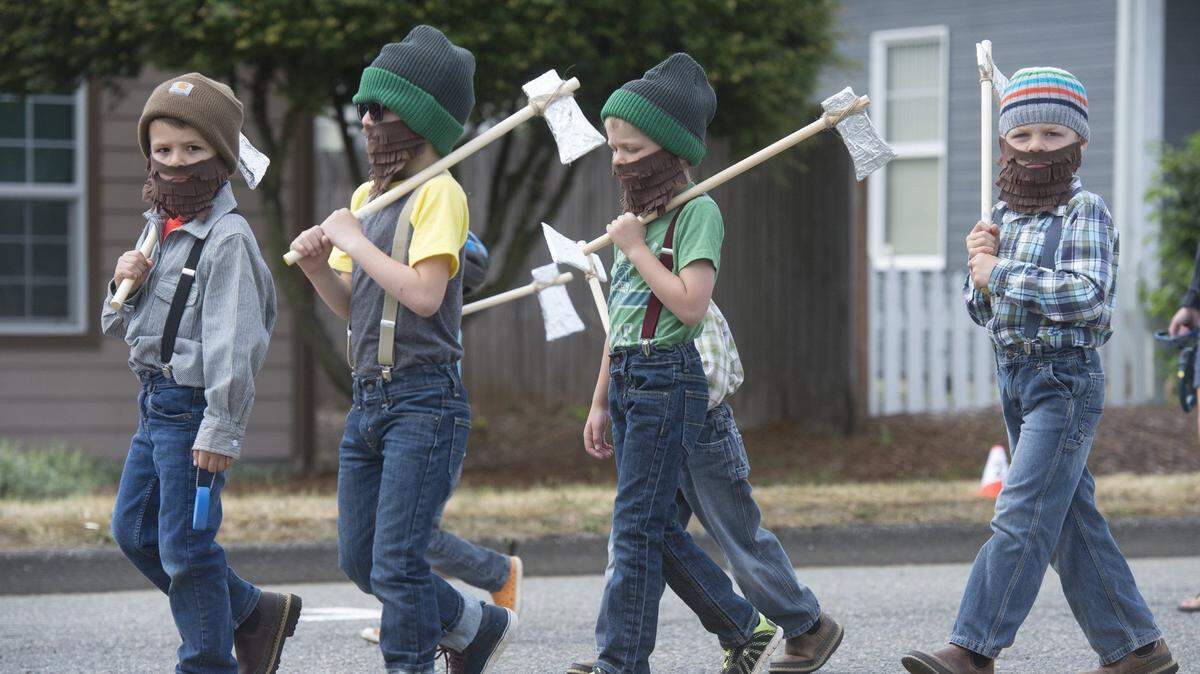 Little loggers with the Jacob Benedict American Family Insurance Agency march down Railroad Avenue during the Shelton Forest Festival’s Paul Bunyan Grand Parade in downtown Shelton in 2017. The 2021 Mason County Forest Festival is spreading out its annual celebration over several weekends, but still hopes to hold the traditional Paul Bunyan parade in September.