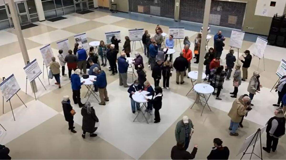 About 100 people attended an open house earlier this month at Salish Middle School in northeast Lacey to ask questions and provide feedback on the city’s neighborhood commercial districts.