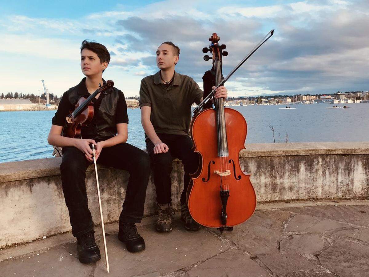 Olympia musicians Eros, left, and Dante Faulk, who are brothers, will be among the performers at Arts Walk’s Fiddle Fest at New Traditions Cafe.