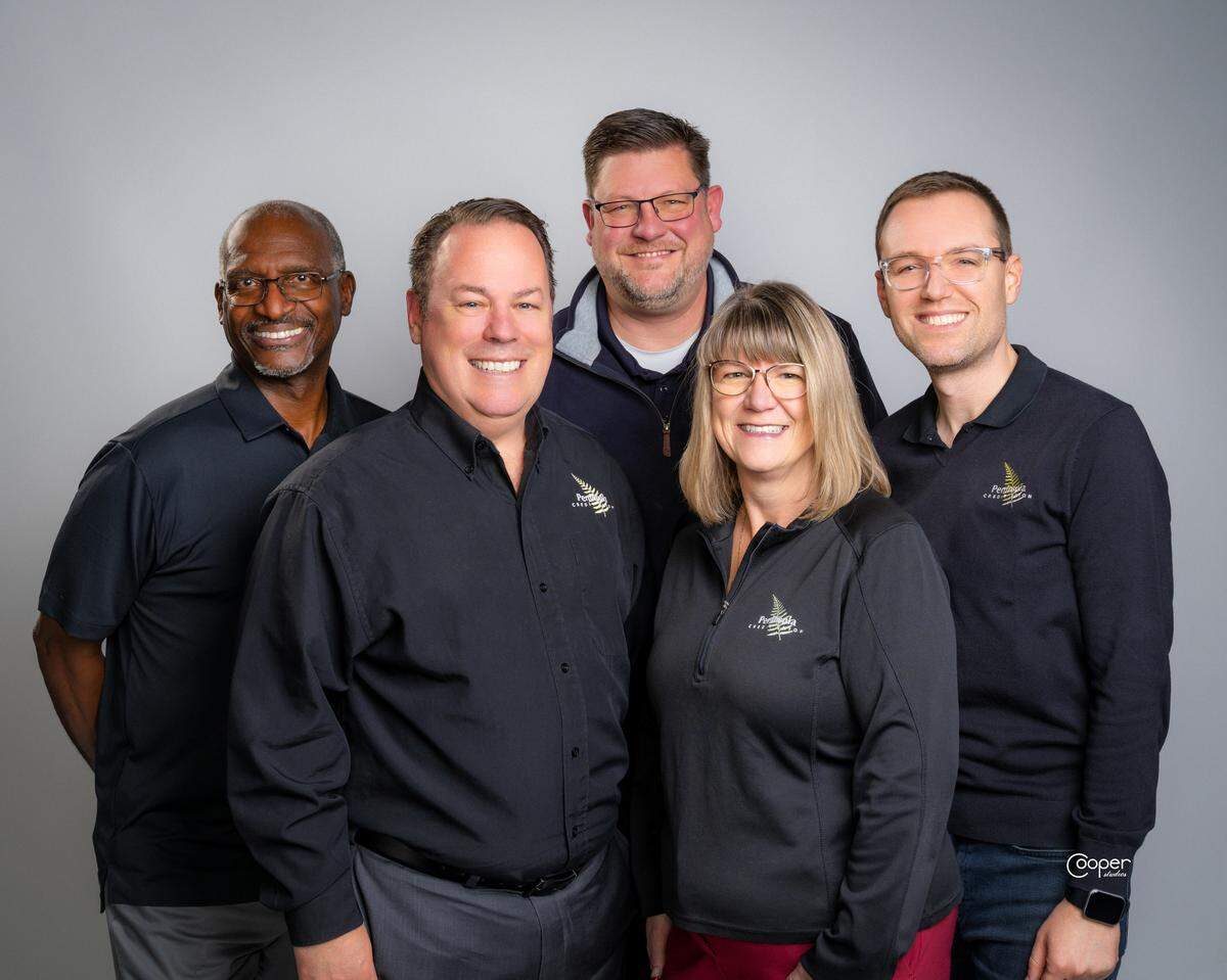 The Peninsula Credit Union team, including President and CEO Jim Morrell.