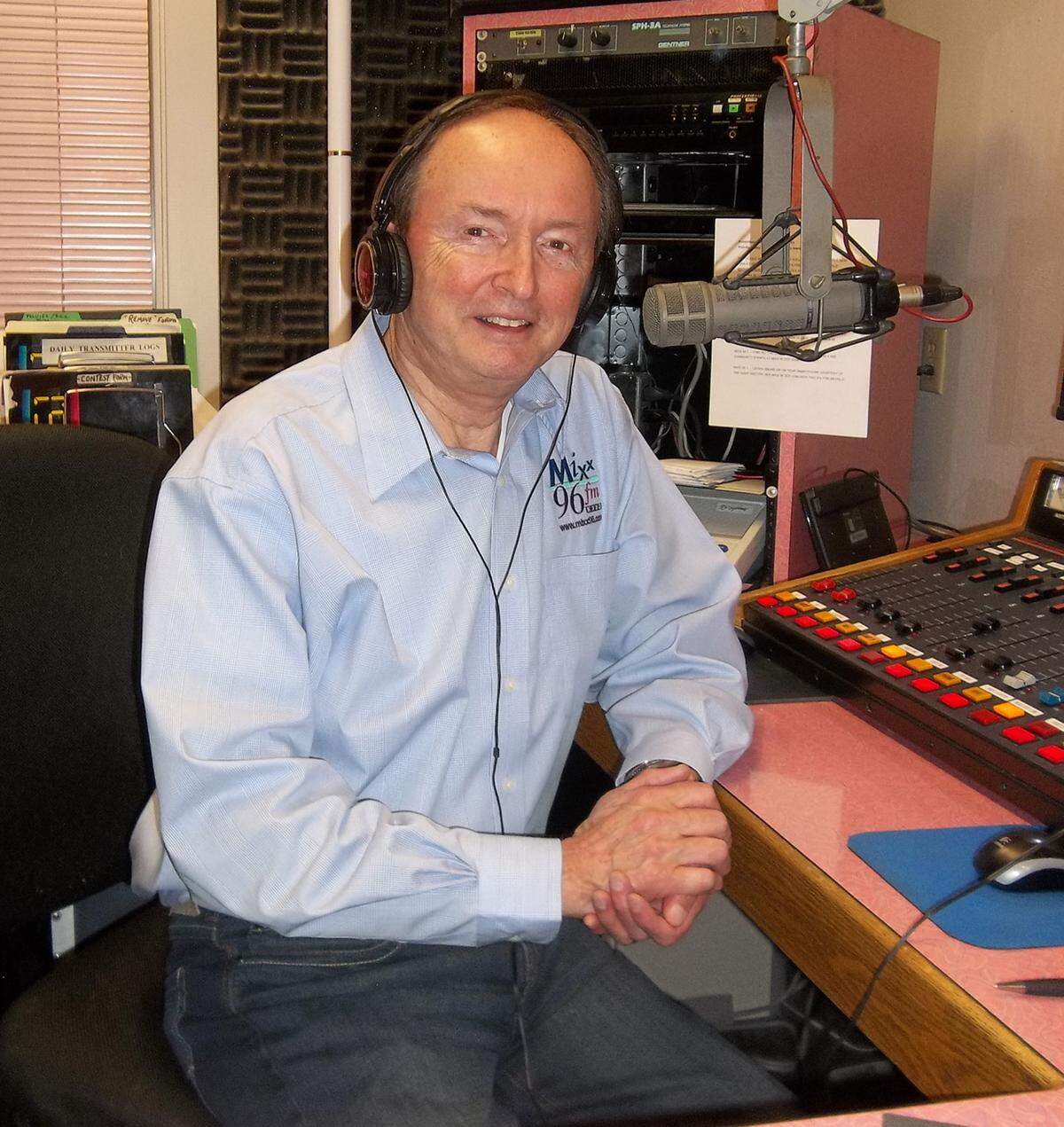 Radio personality Dick Pust hosts a weekly interview show titled “In Your Community” on KXXO Mixx 96.1 FM in Olympia in 2013.