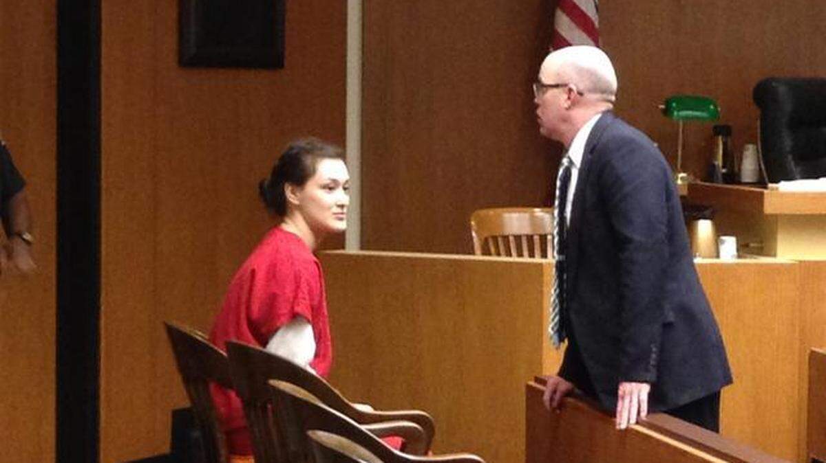 Lia Tricomo (left) appreared with defense attorney Patrick O’Connor at a sentencing hearing Wednesday, Jan. 28, 2015. Tricomo will serve 29 years, 9 months for the murder of her former counsellor and roommate.