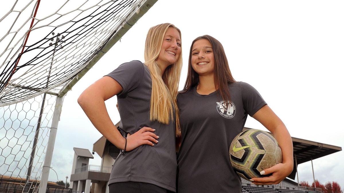 Ainsley Wall (left) and Mia Cuiouo along with their T-Birds’ teammates are atop of the 2A Evergreen Conference and looking like a strong state contender in 2A.
