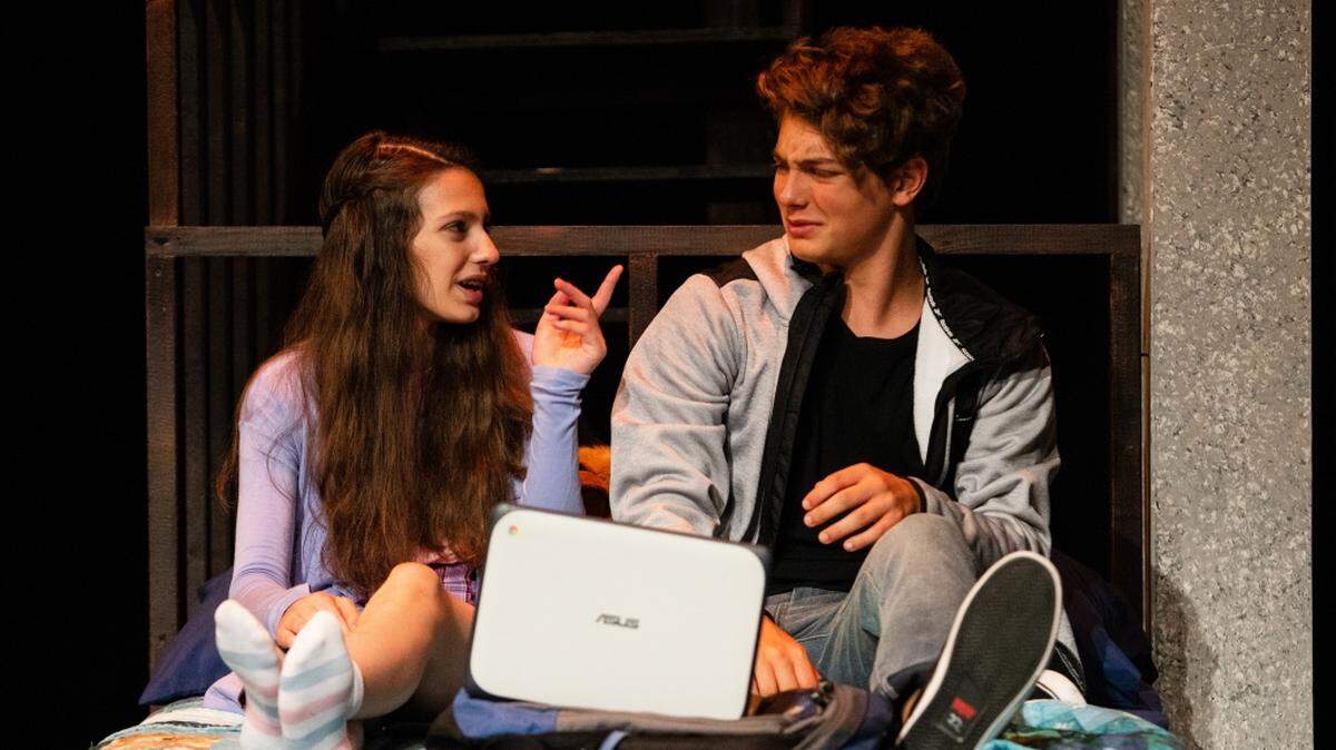 Cosette Yanasak as Julie and Jones Dillard-Disston as Zander in Harlequin Productions’ ”This Flat Earth,” opening this weekend. Yanasak is sharing the role of Julie with Annabeth Collett.