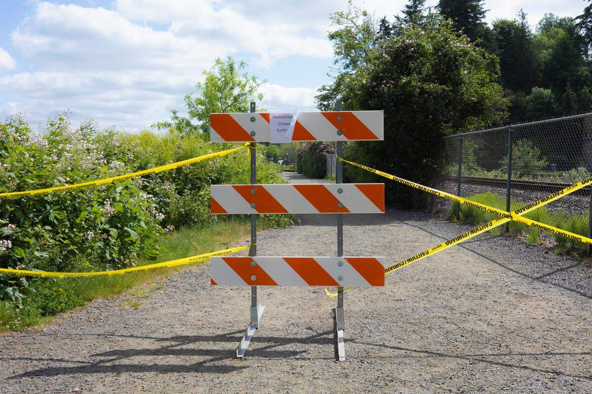 The Washington State Department of Enterprise Services closed a pedestrian bridge linking Marathon and Heritage parks after a man allegedly vandalized the WA Capitol building and drove his vehicle onto the bridge Thursday, June 4, 2026. A sign on the Marathon Park pathway to the bridge indicated it would be “closed until further notice.”