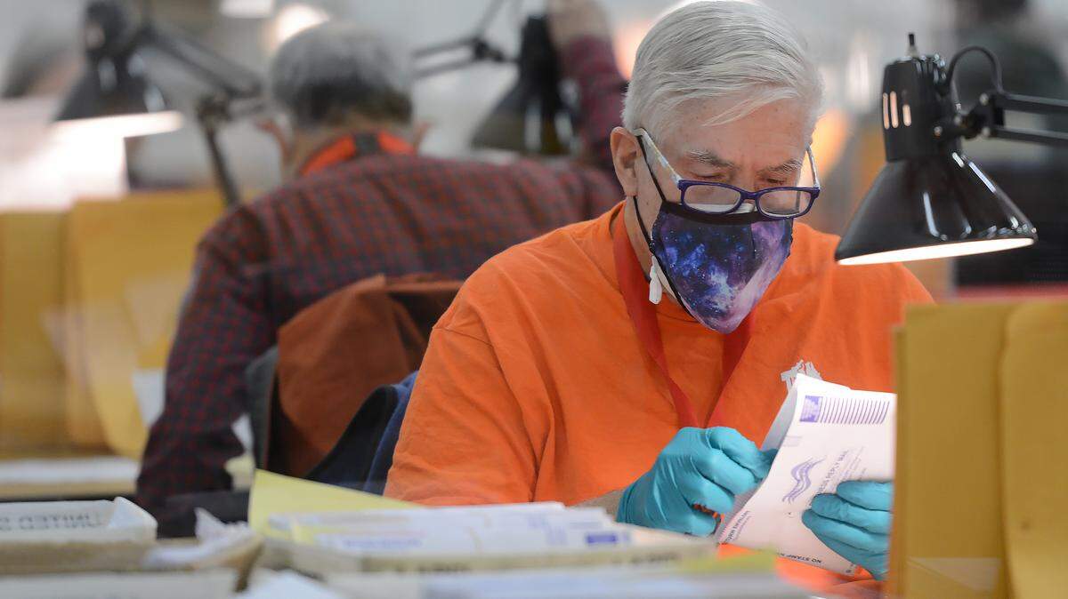 Staff at the Thurston County Ballot Processing Center were in high gear working thru the flood of mail-in ballots on Election Day Nov. 3,.2020.