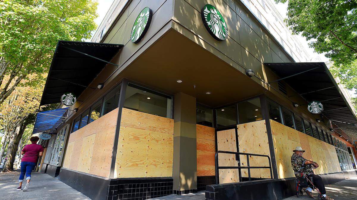 Starbucks at the corner of Legion Way and Capitol Way was closed Saturday after what police are calling a “highly aggressive mob” broke windows, tagged buildings with graffiti, and set dumpsters on fire Friday night.