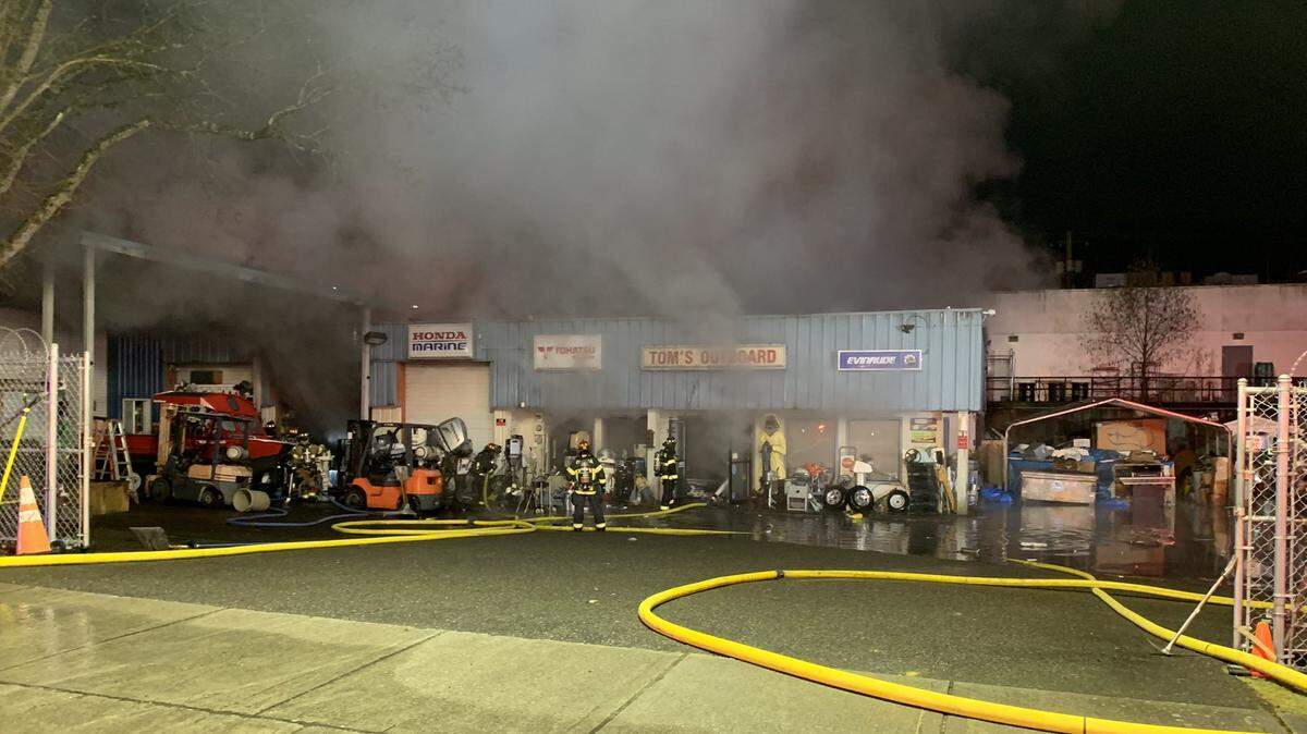 Olympia firefighters and police responded to a commercial fire at Tom’s Outboard on East Bay Drive Southeast at around 1:30 a.m. Friday. One person, found at the scene, suffered minor burn injuries.