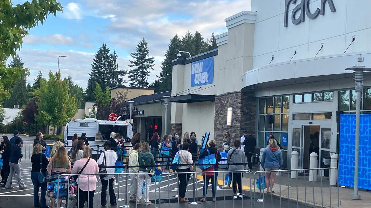 Eager Nordstrom Rack shoppers line up outside the new store Thursday morning at 1200 Cooper Point Road SW.