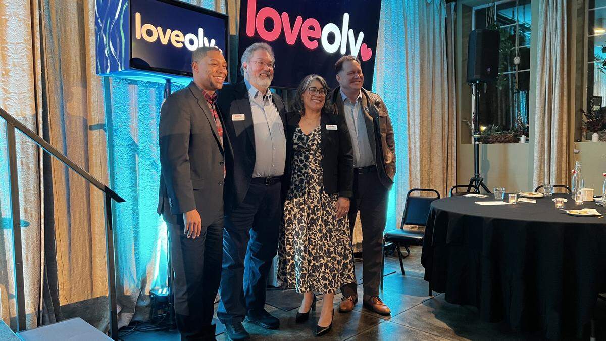 Olympia Mayor Dontae Payne, Olympia Downtown Alliance President Erik Johnson, ODA Executive Director Desiree Freeland and ODA board member Aslan Meade at the ODA’s annual meeting.