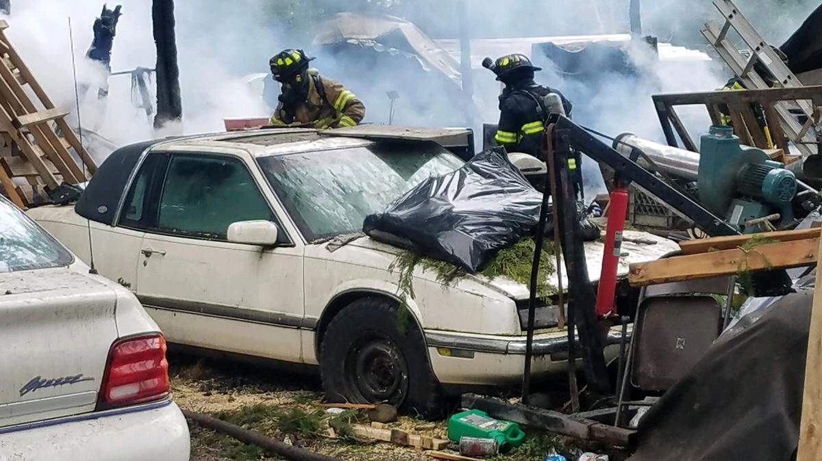 A Saturday morning fire destroyed a shop, which was doubling as a residence, as well as a motor home on Rainier Road Southeast, according to the SE Thurston Fire Authority in Yelm.