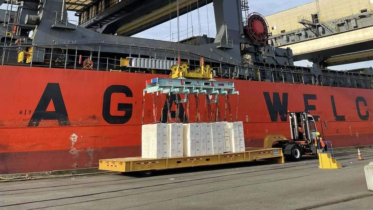 Paper products from Brazil are shown being unloaded from a ship at the Port of Olympia in early December.