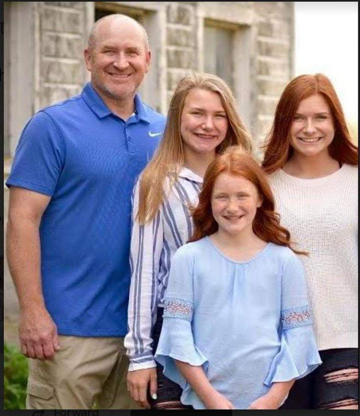 Troy Larson with his three daughters Cierra, Alyssa and Breanna.