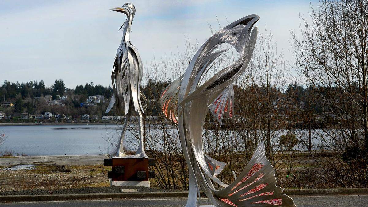 The West Bay Art Crossing site along West Bay Drive Northwest features a 7-foot salmon sculpture and 14-foot heron sculpture.