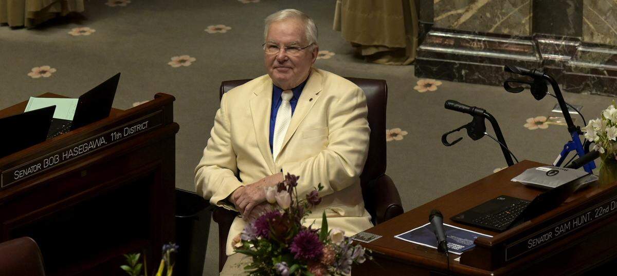 Sen. Sam Hunt, D-Olympia, who is retiring from the legislature, gazes up to the public gallery in the chamber on Sine Die Thursday, the session’s last day.