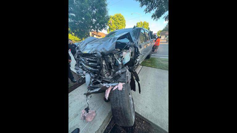 Coroner IDs woman killed after car crashed into Thurston County apartments