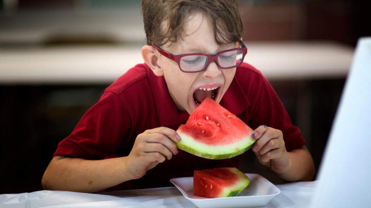 Washing the outside of a melon before cutting it keeps you from contaminating the inside of the melon.
