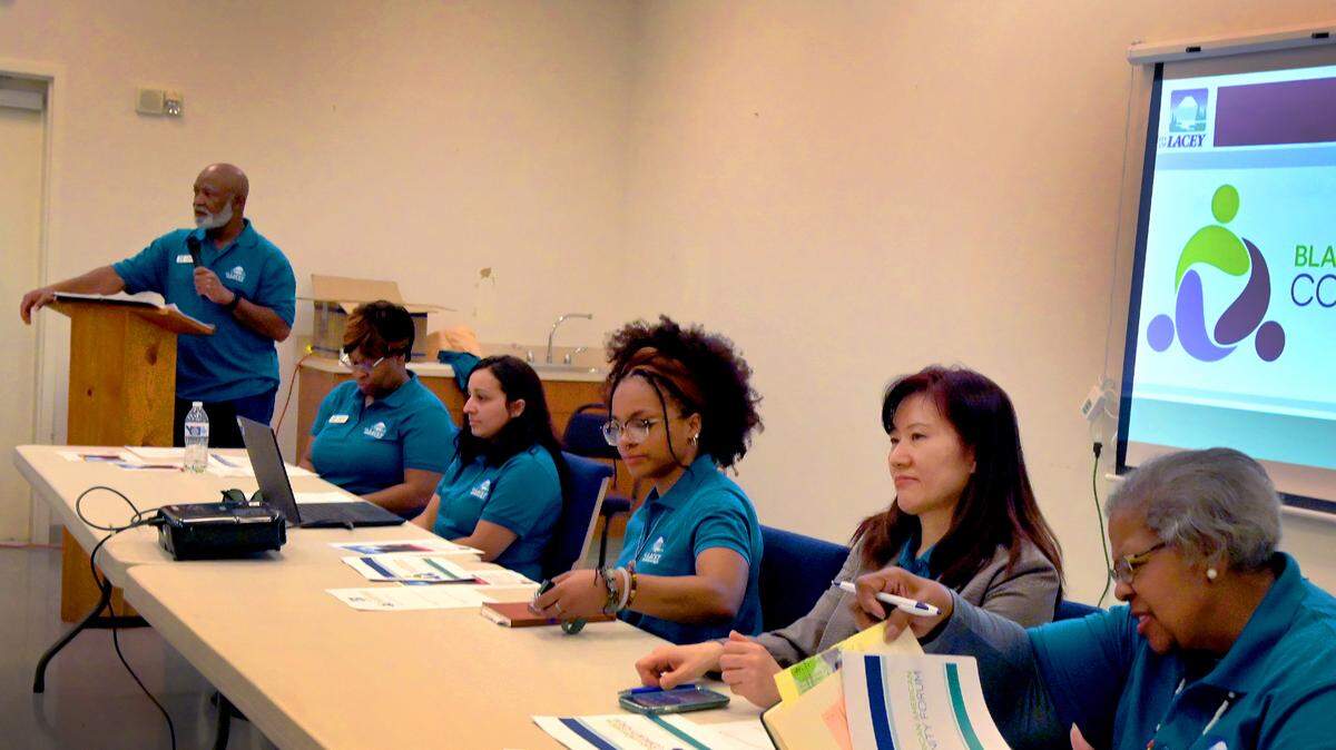 Members of the city of Lacey’s Commission on Equity speak during the Black and African American Community Forum on Tuesday, March 21 at the New Life Baptist Church. On Monday, the commission discussed the gathering.