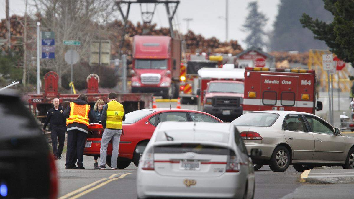 Franklin Street is filled with emergency vehicles as Olympia firefighters respond to a hydrogen peroxide leak at the Port of Olympia on Wednesday, Jan. 28, 2015.