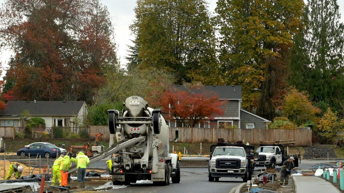 Work crews begin installing sidewalks on Monday, Nov. 7 at the new Rob Rice development named Village at Cain Road.