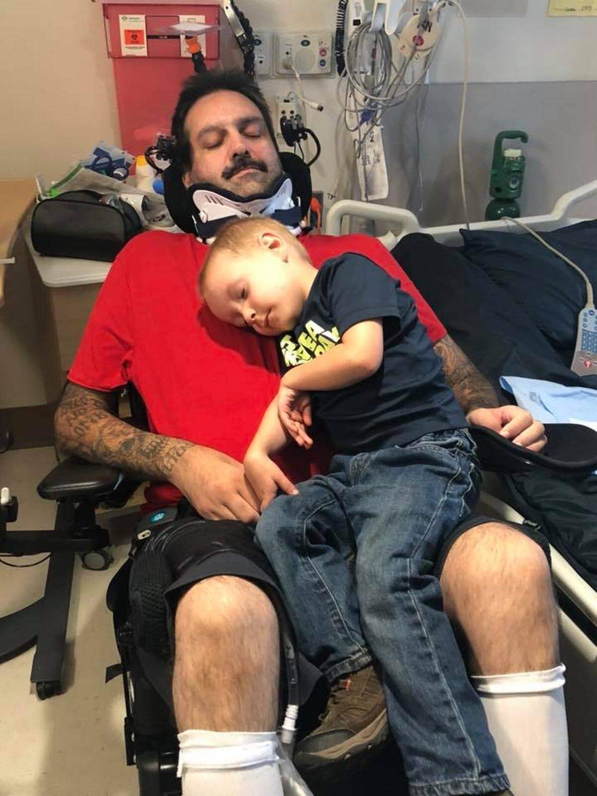 Rickey Fievez visits with his grandson Aiden, 3, at Harborview Medical Center on Aug. 29.
