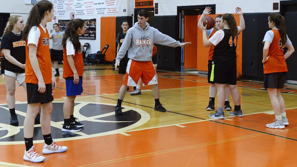 Rainier head coach Brandon Eygabroad goes over a play scheme with his during the team’s Feb.19th practice.The Mountaineers are 21-2 and headed to the state regionals for the first time since 2012.