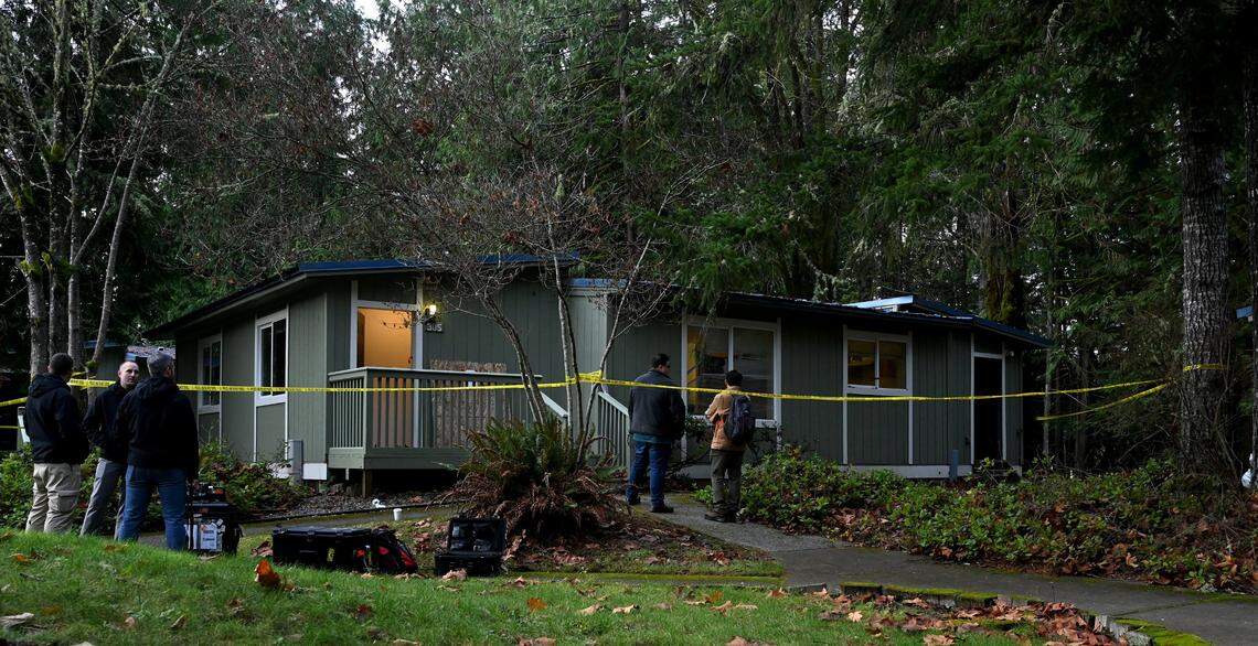 Investigators work the scene of a suspected carbon monoxide poisoning on Dec. 13, 2023, at a unit in the student modular housing section of The Evergreen State College. According to a college spokesperson one student died and two other students were hospitalized on the evening of Monday, Dec 11.