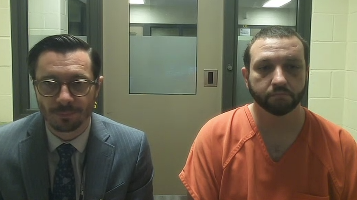 Scott Brodrick, 42, (right) and public defense attorney Matthew Kellegrew attend Brodrick’s preliminary appearance in Thurston County Superior Court on Monday, Aug. 28, 2023. Brodrick is accused of shooting Brian Fraley, 43, at a Lacey area home on Aug. 21, 2023.