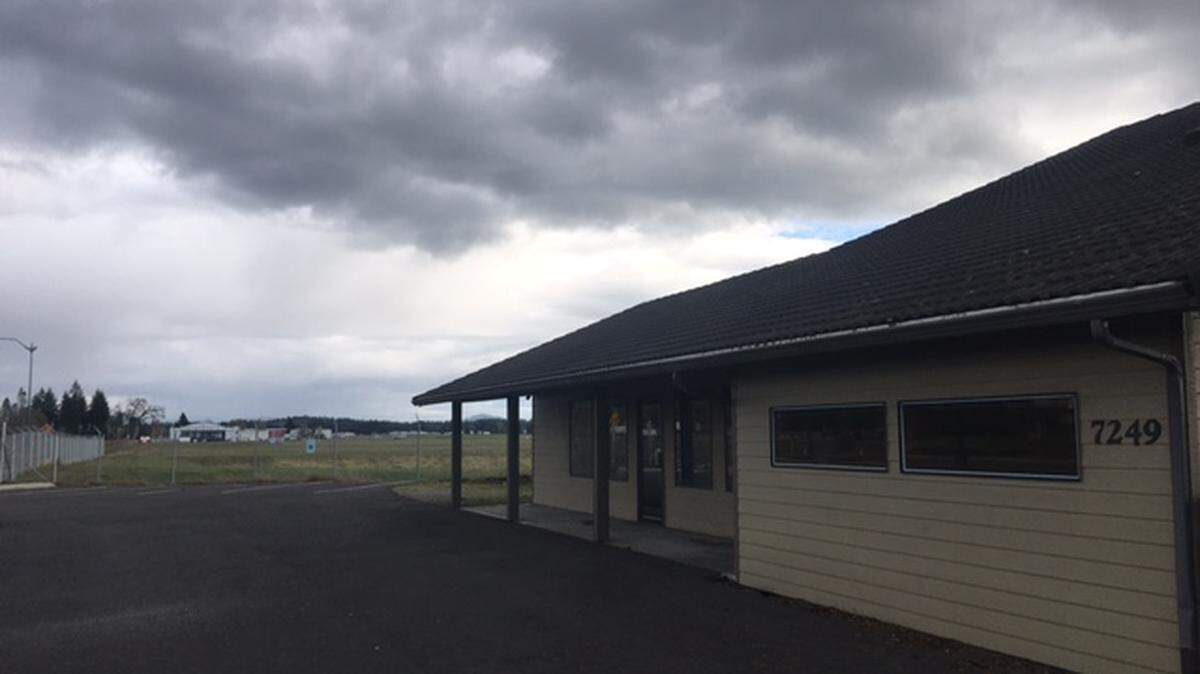 The property to be held in trust is at 7233 and 7249 Old Highway 99, between Tumwater Boulevard and Henderson Boulevard. A check of the property shows an office building at the 7249 address. Olympia Regional Airport is in the distance.