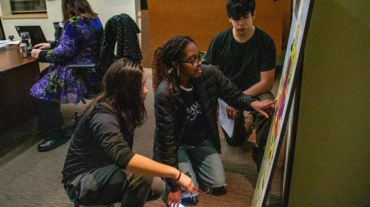 North Thurston junior Abigail Asare points to a map of the City of Lacey’s Urban Growth Area during a youth council meeting Feb. 2. Asare is the project manager for the city’s youth council.