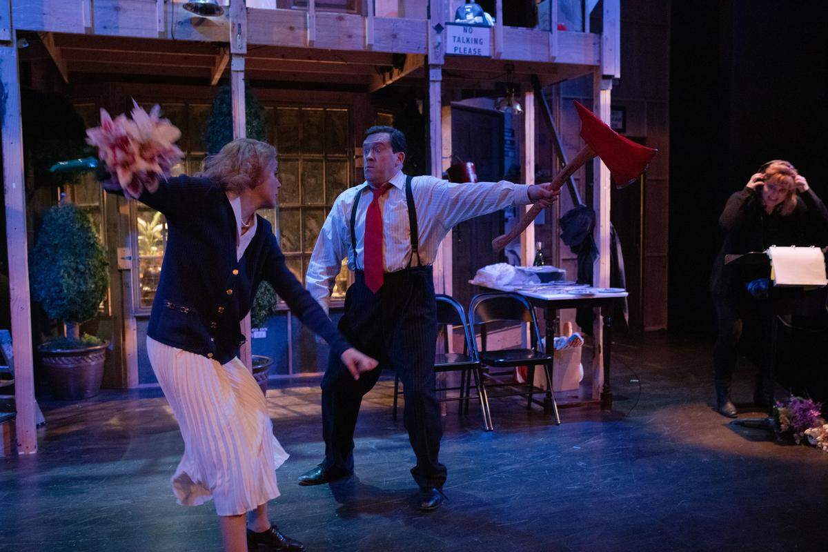 From left, actors Helen Harvester, Jason Haws and Megan Ahiers perform a scene from Harlequin Productions’ ”Noises Off.” The farce closes this weekend.