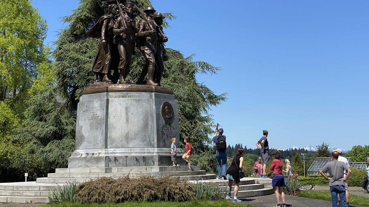 Families enjoyed the unseasonably warm temperatures this weekend as they visited the Winged Victory on the state Capitol Campus.