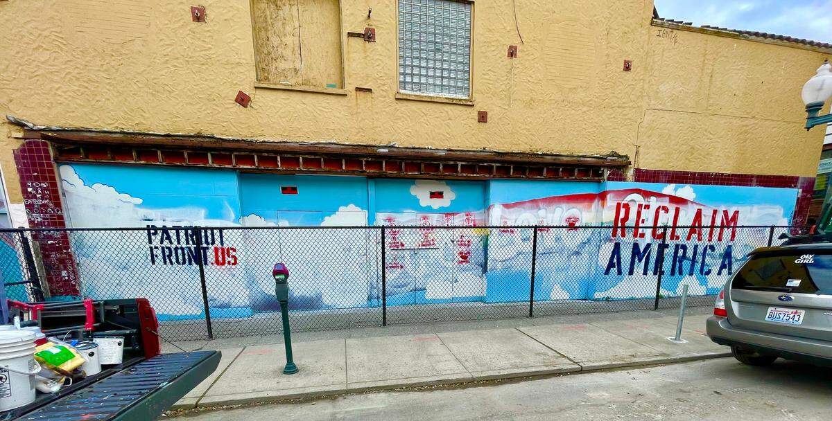 Two members of the Patriot Front, both from Washington, defaced a pride mural in downtown Olympia in October 2021.