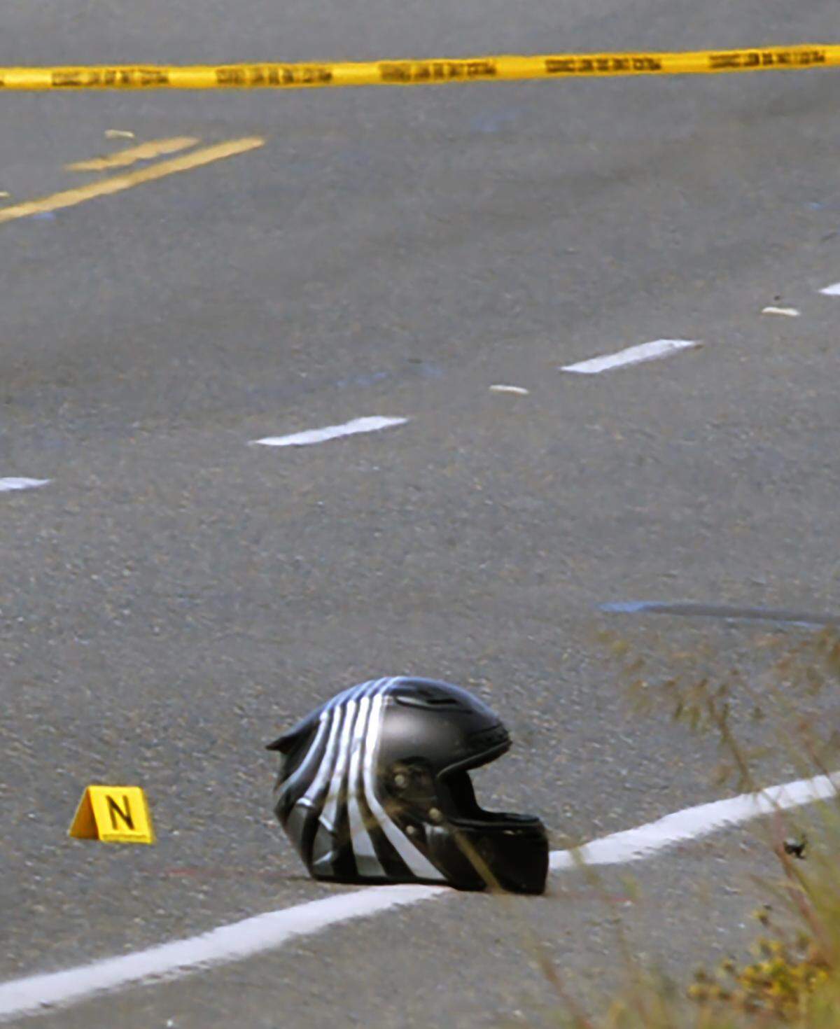 Olympia Police Dept. investigators process the scene of a morning fatal motorcycle crash in the 3700 block of Pacific Avenue Southeast Tuesday, May 31, 2022 Witnesses at the scene tried to resuscitate the man, but he died at the scene, according to OPD spokesperson Lt. Paul Lower.