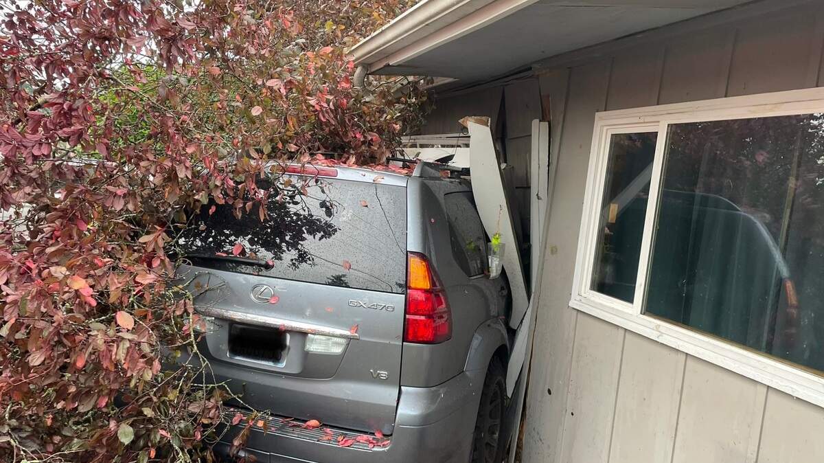 The driver was uninjured after crashing into the Thurston County house, but then suffered a medical emergency and was taken to an area hospital, according to a Lacey Fire District 3 official.