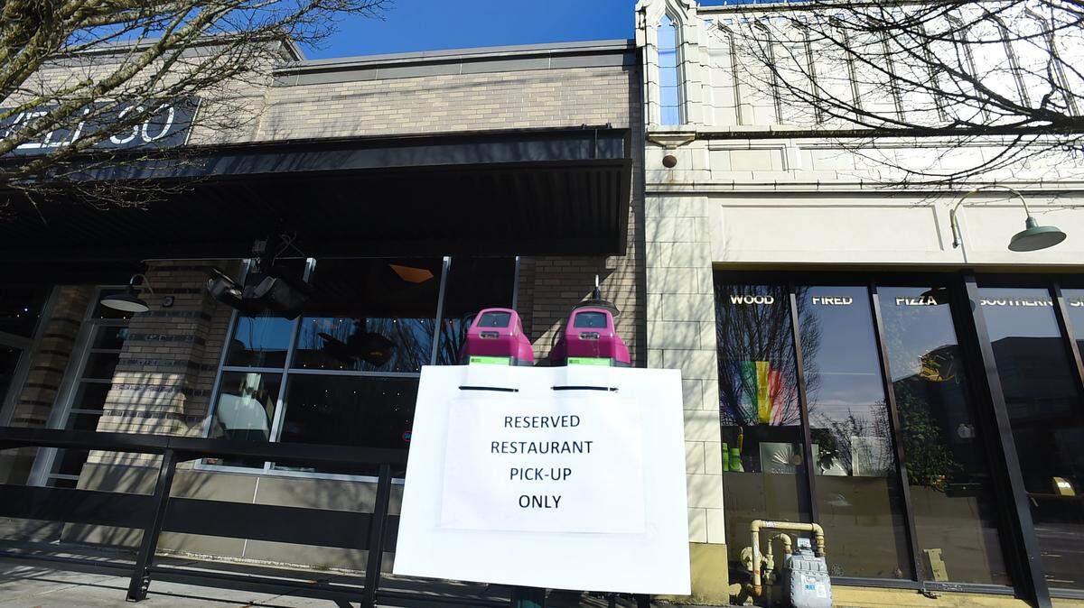 Two parking meter stalls between Well 80 and Equal Latin restaurants along Olympia’s 4th Avenue are posted as reserved for order pick-ups only on March 18th. According to Equal Latin’s facebook page a March 17th posting update advises that they’ll be closed until next Monday and plan to reopen for pick-up & delivery orders.