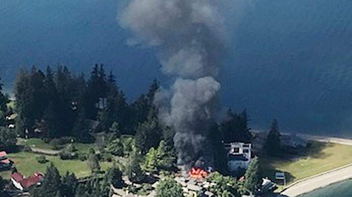 A fire, which produced a column of smoke that could be seen for miles , damaged two detached garages on Johnson Point Saturday afternoon, according to a fire official.