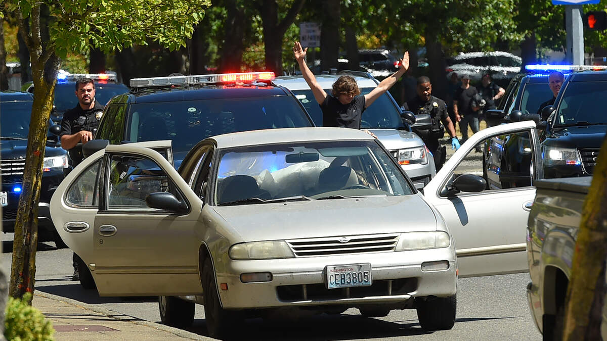 Olympia and Lacey police officers arrested three juveniles and an adult man who fled from the scene of a robbery on Fourth Avenue East in Olympia Wednesday afternoon, July 19.