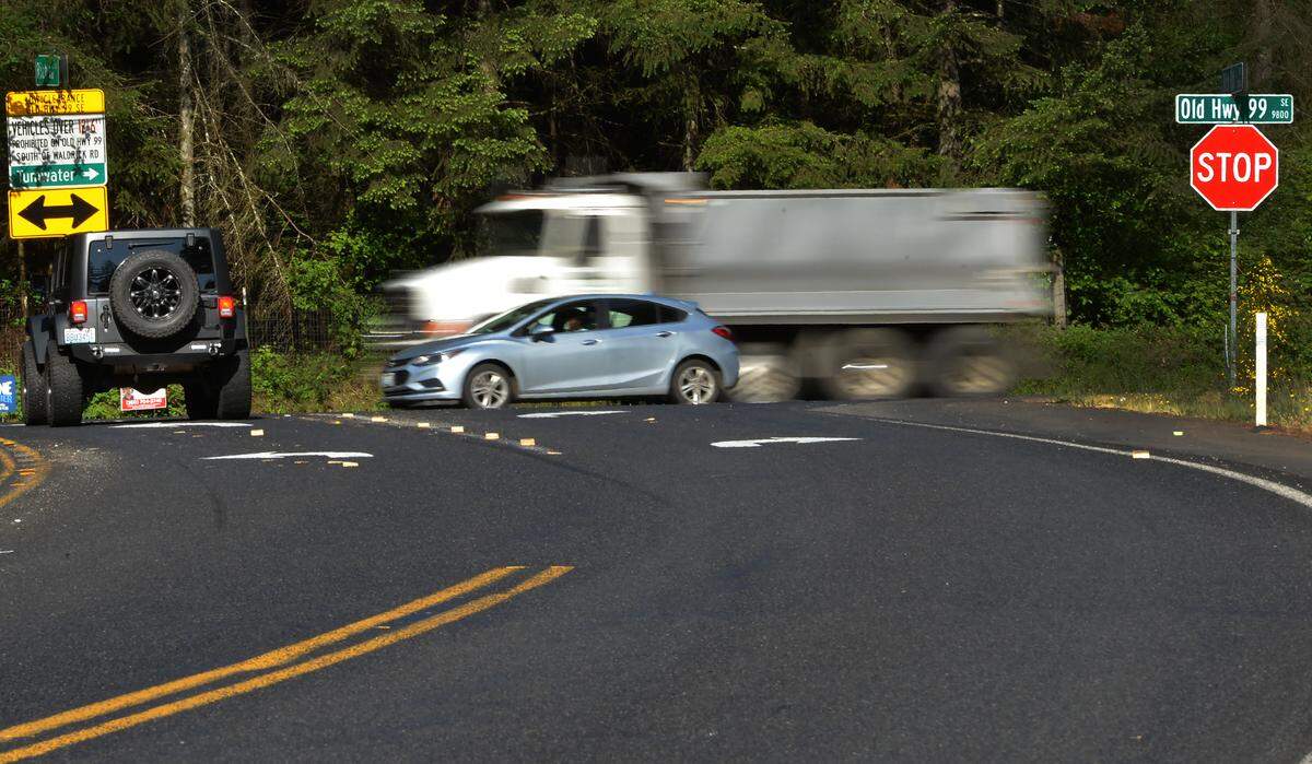 Motorists make their way along Old Highway 99 at Rich Road Southeast, an intersection that has been listed in the Thurston County Mobility Strategy Study as one of 14 locations where improvements should be made.