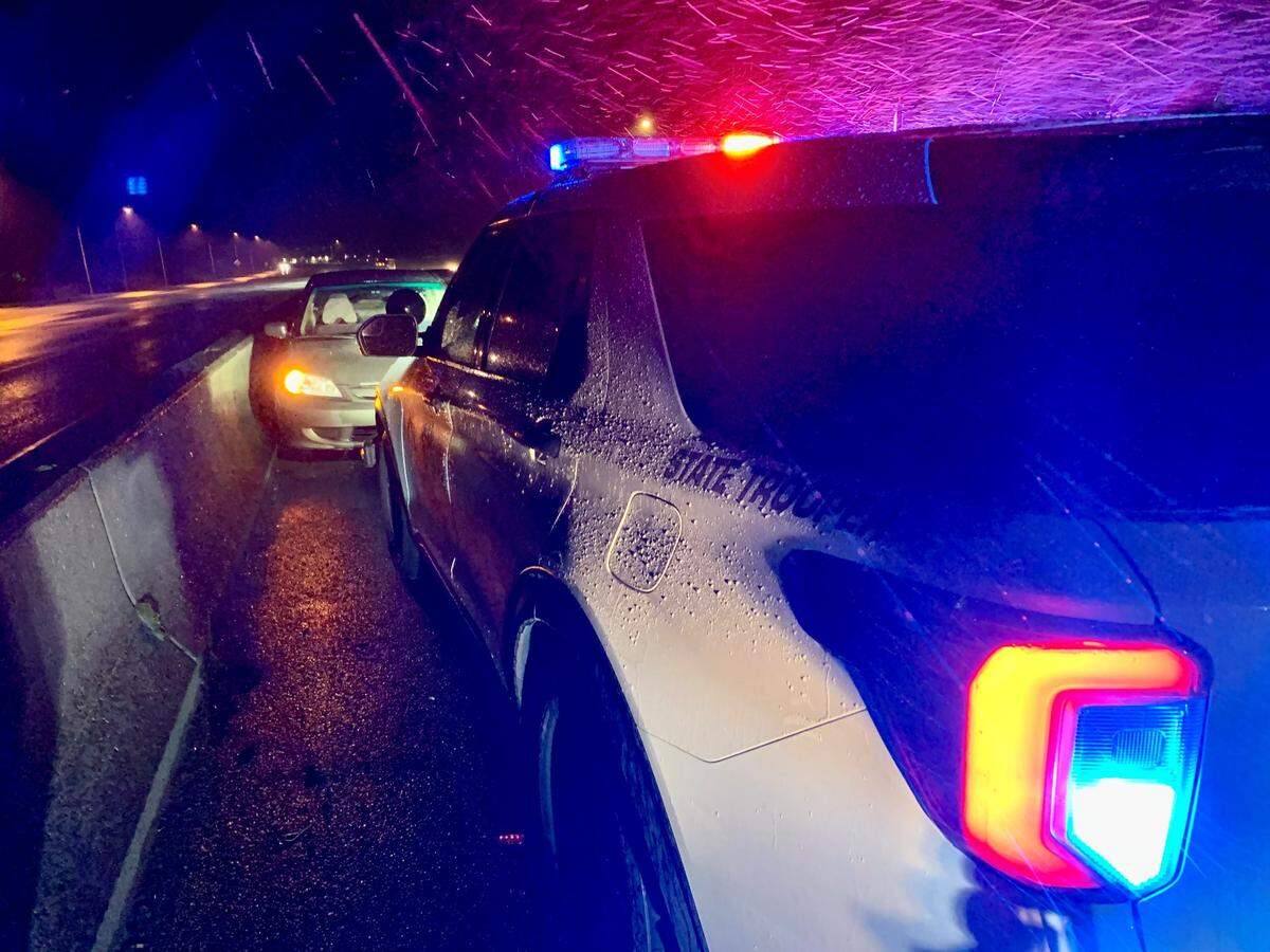 A 28-year-old Tacoma woman was taken into custody early Sunday morning after she drove the wrong way on I-5. The trooper’s vehicle is pointed in the right direction; hers is not.