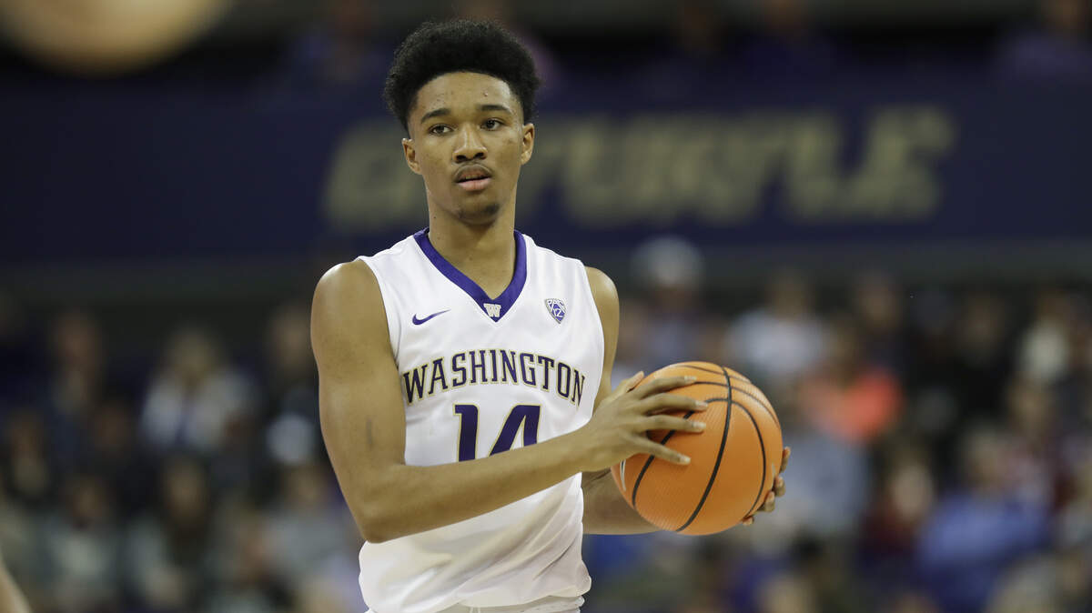 Washington guard Michael Carter III holds the ball during an NCAA college basketball game against Washington State, Sunday, Jan. 28, 2018, in Seattle.
