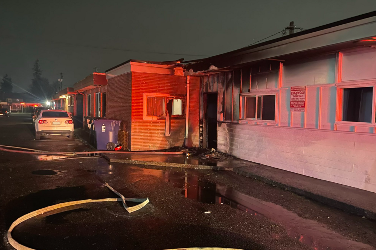 A 33-year-old man was arrested on suspicion of first-degree arson after a garbage pile set outside a South 11th Street Tacoma apartment ignited and a resident was treated.