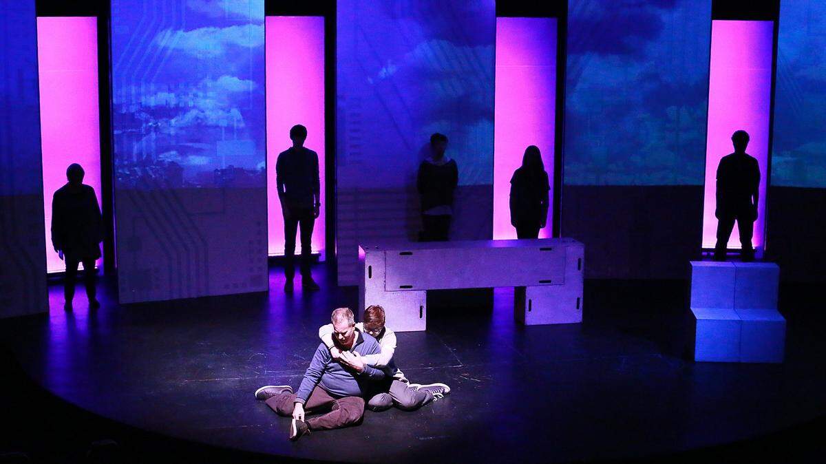 Gerald B. Browning (blue shirt) and Skylar Bastedo in “Love and Information,” in its closing weekend at the State Theater in Olympia.