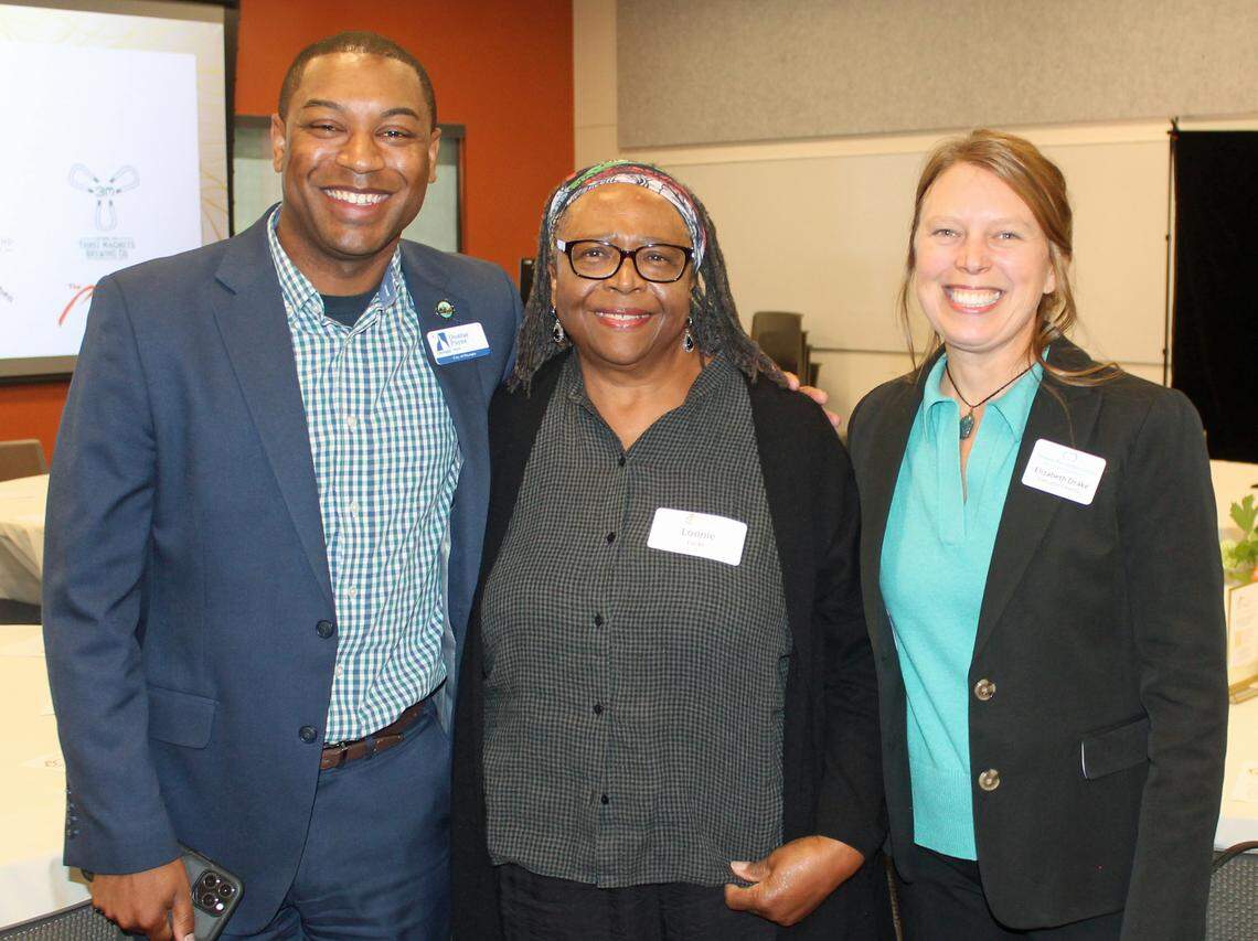 Lonnie Locke (center), recipient of the DRC’s 2025 Peacemaker Award, with Olympia Mayor Dontae Payne and DRC Executive Director Elizabeth Drake.