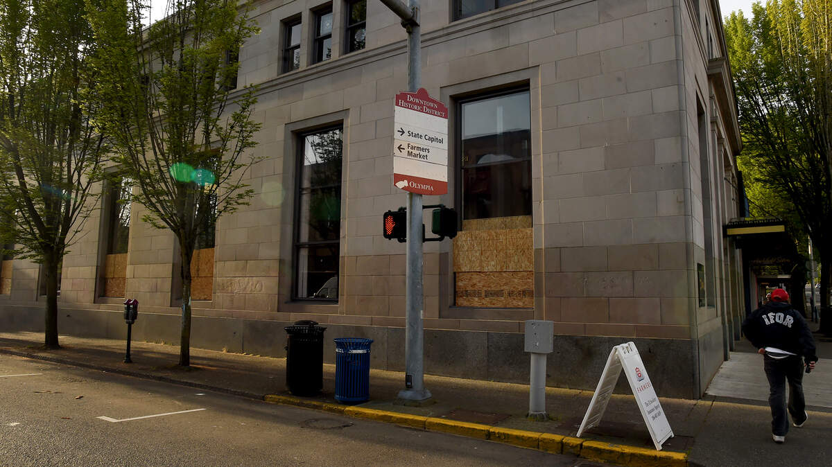 Windows were still boarded and glass was broken at downtown Olympia branch of U.S. Bank on Thursday, May 3, 2018. Several buildings were damaged overnight, according to Olympia Police Department reports.